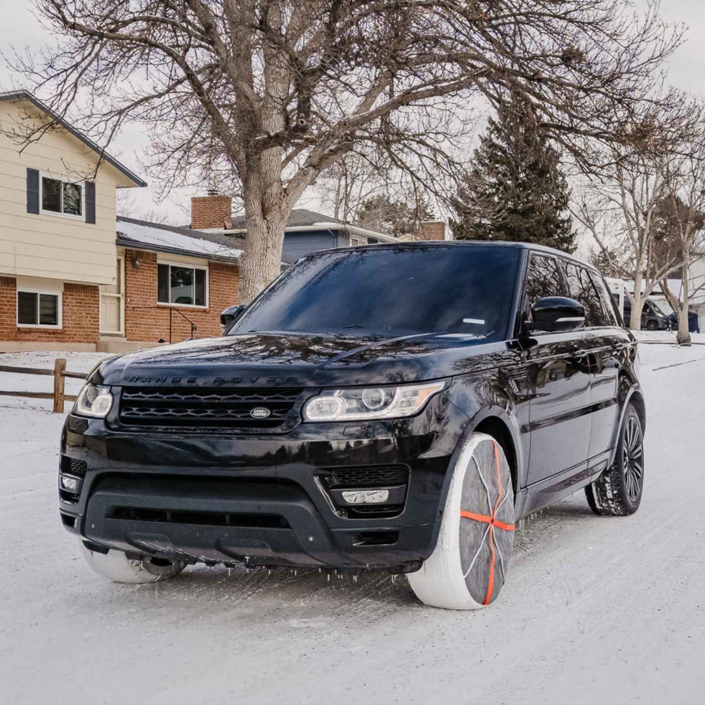 Textile snow chains mounted on Land Rover SUV